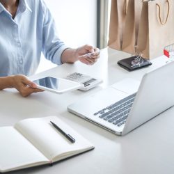 Woman using credit card register security code and payments online shopping and customer service